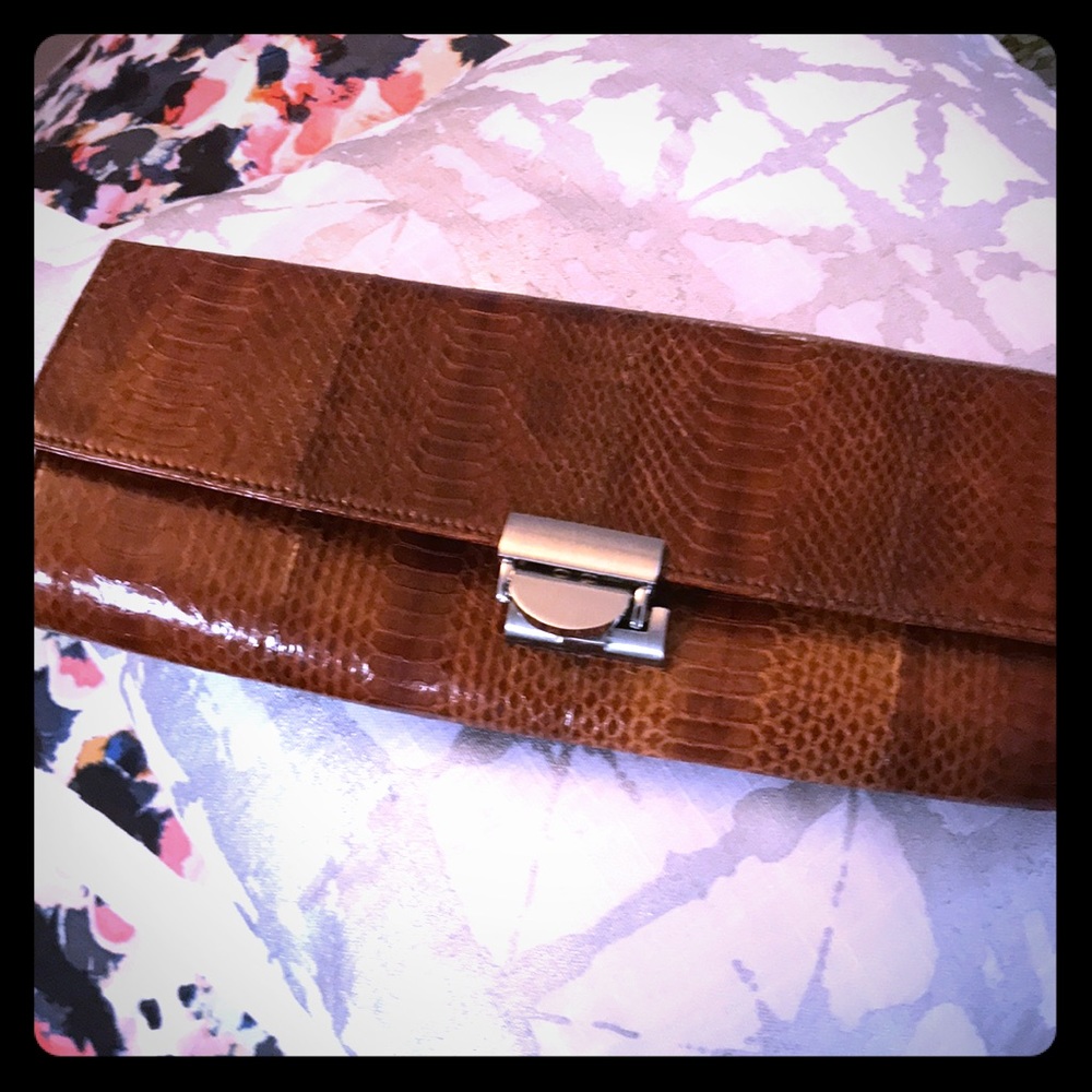 Vintage skin and suede clutch